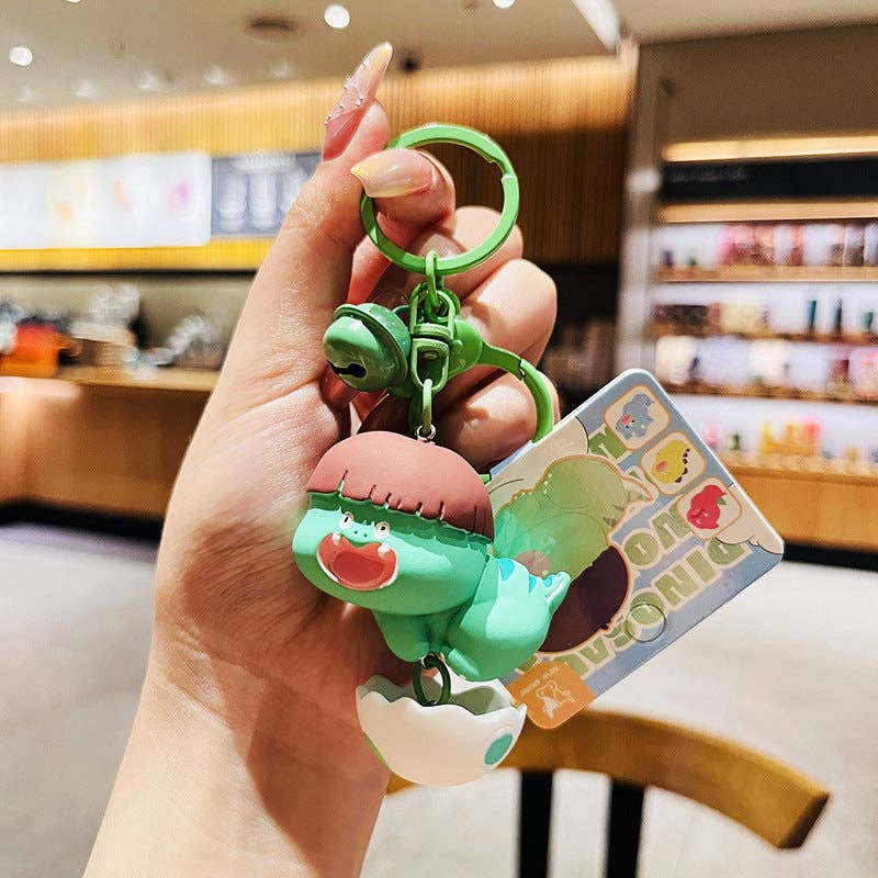KiddieKickz – wholesale Keychain – Child – Cartoon Dinosaur Holding Egg PVC Soft Keychain1