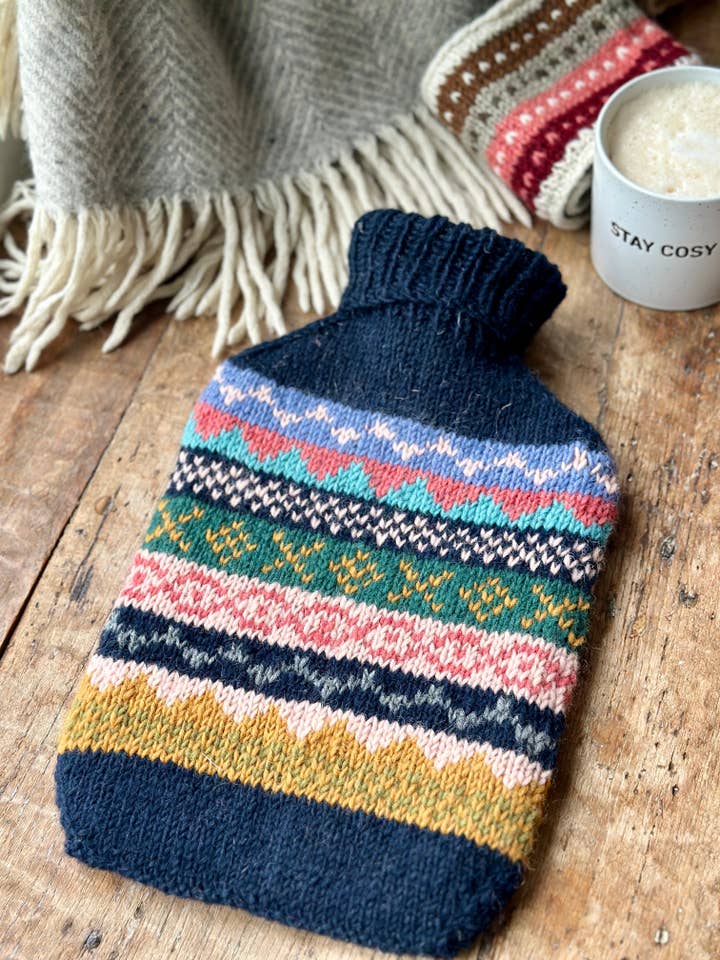 Dark Blue, Coral & Ochre Hand Knitted Fair Isle Hot Water Bottle for wholesale by Cosy Buddha