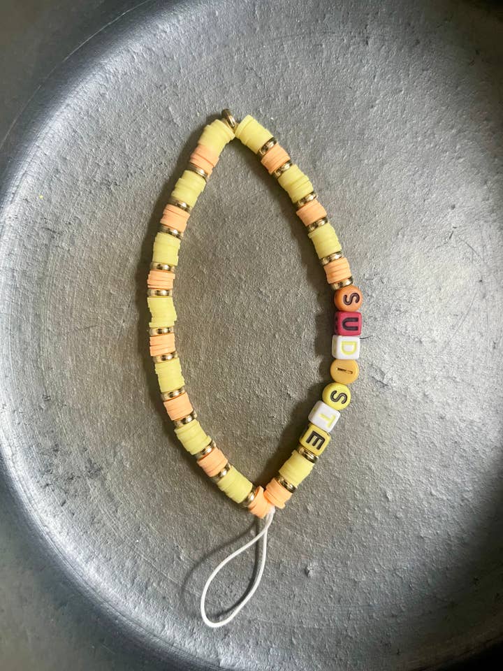 Telefonvedhæng “SYDLANDSK” – Kollektion Sol & Good Vibe for engroshandel hos Orabulle