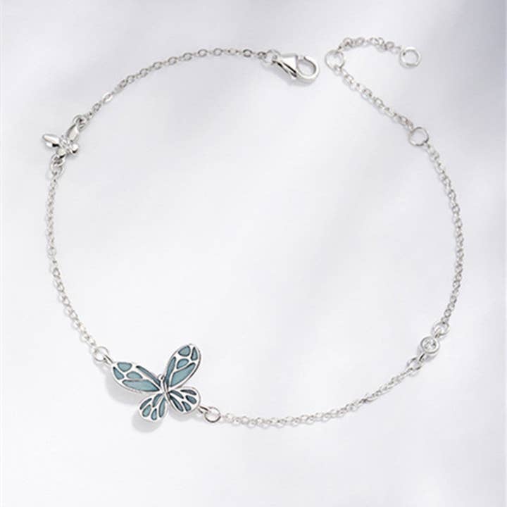 Cute Blue Luminous Butterfly Bracelet in 925 Sterling Silver for wholesale by Perimade & Co. LLC