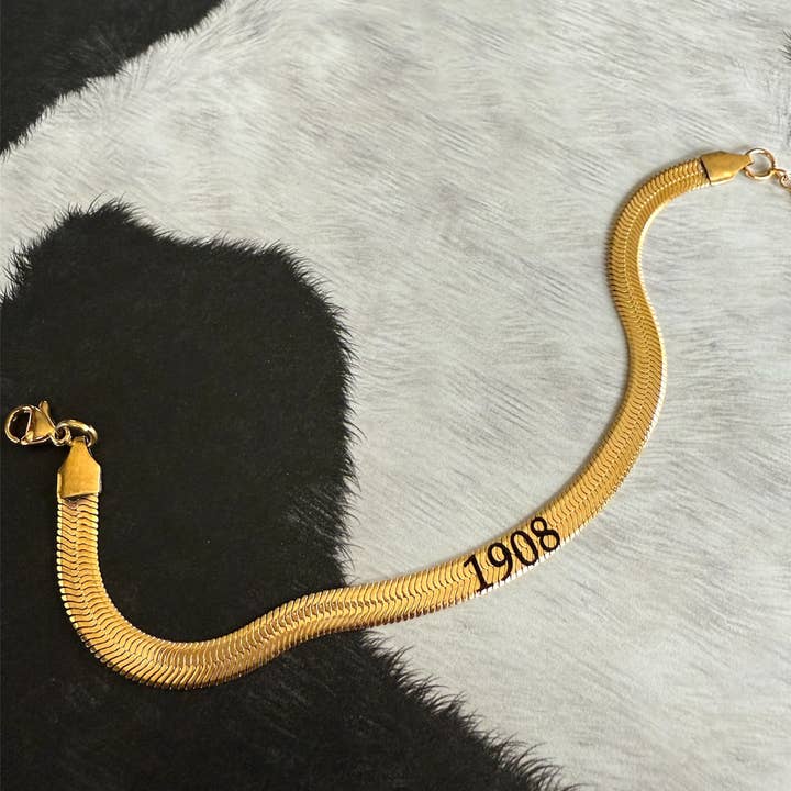 1908 Engraved Gold Stainless Steel Herringbone Bracelet – Elegant Stacking Jewelry AKA Gift for wholesale by BLK Confetti