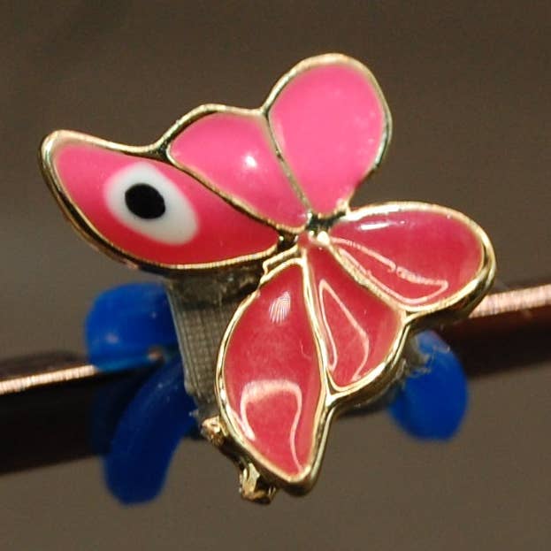 Papillon en forme de cloisonné avec breloque en forme d'œil pour la vente par Www.eyeglasssesdecorations.com