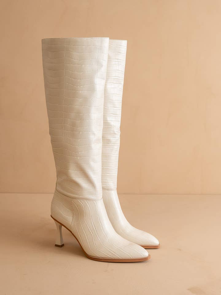SOLD OUTThe Vanessa Off White | Reptile Print Knee High Boot for wholesale on Faire