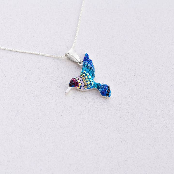 PP-8553 / CRYSTAL & SILVER SMALL COLIBRI PENDANT for wholesale by Mosaico Jewels