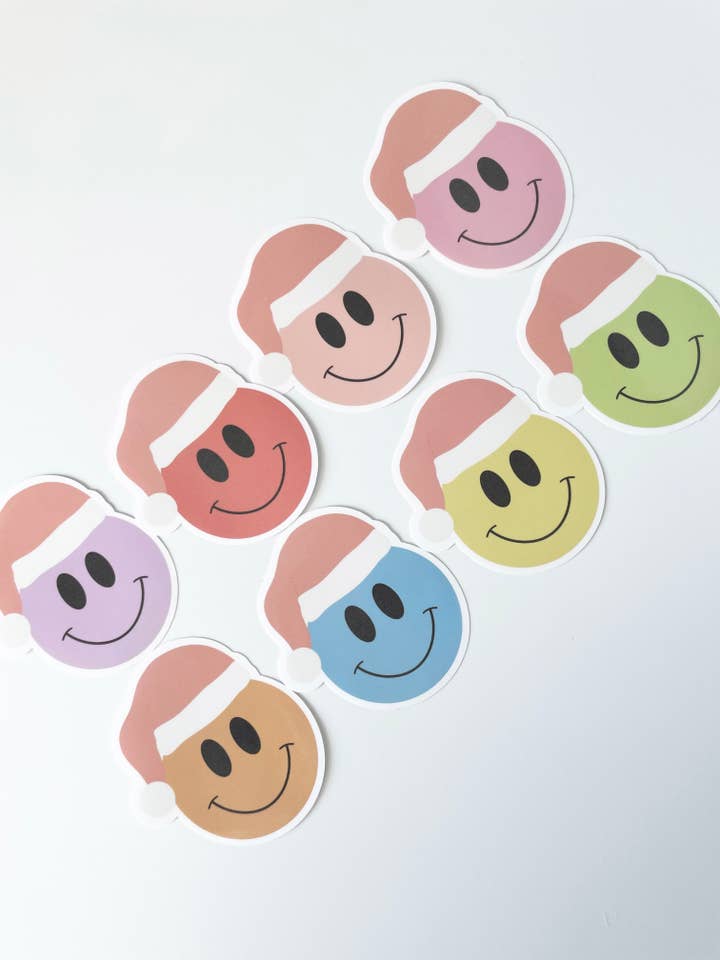 Autocollant Smiley Face avec bonnet de Noël pour la vente par Designed by M and S