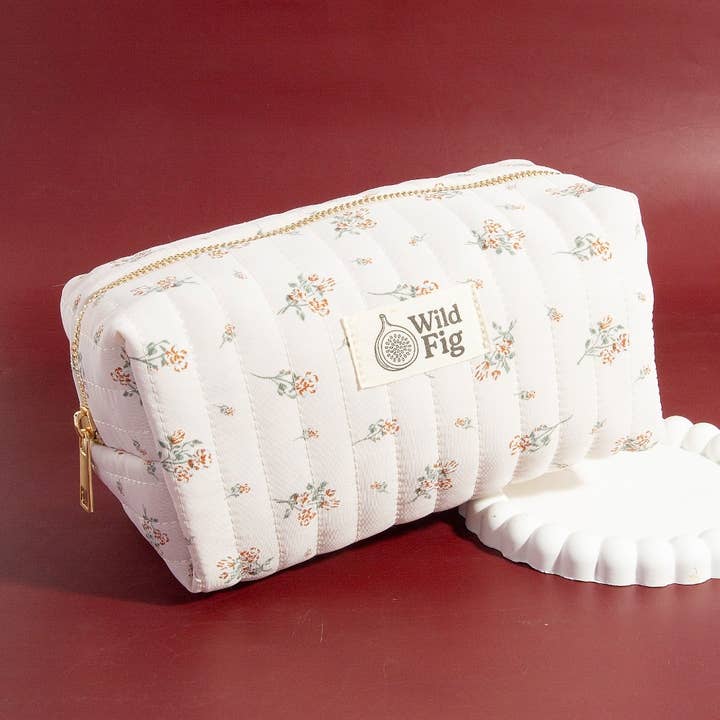Trousse de maquillage matelassée à motif floral pour la vente par Collections by Fame Accessories
