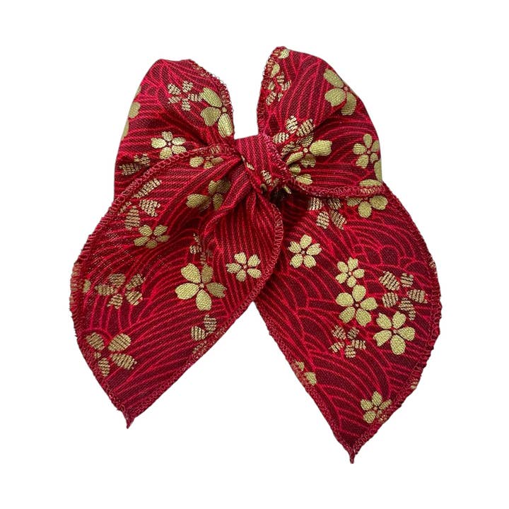nœud de fable floral rouge et doré pour la vente par Mai & I