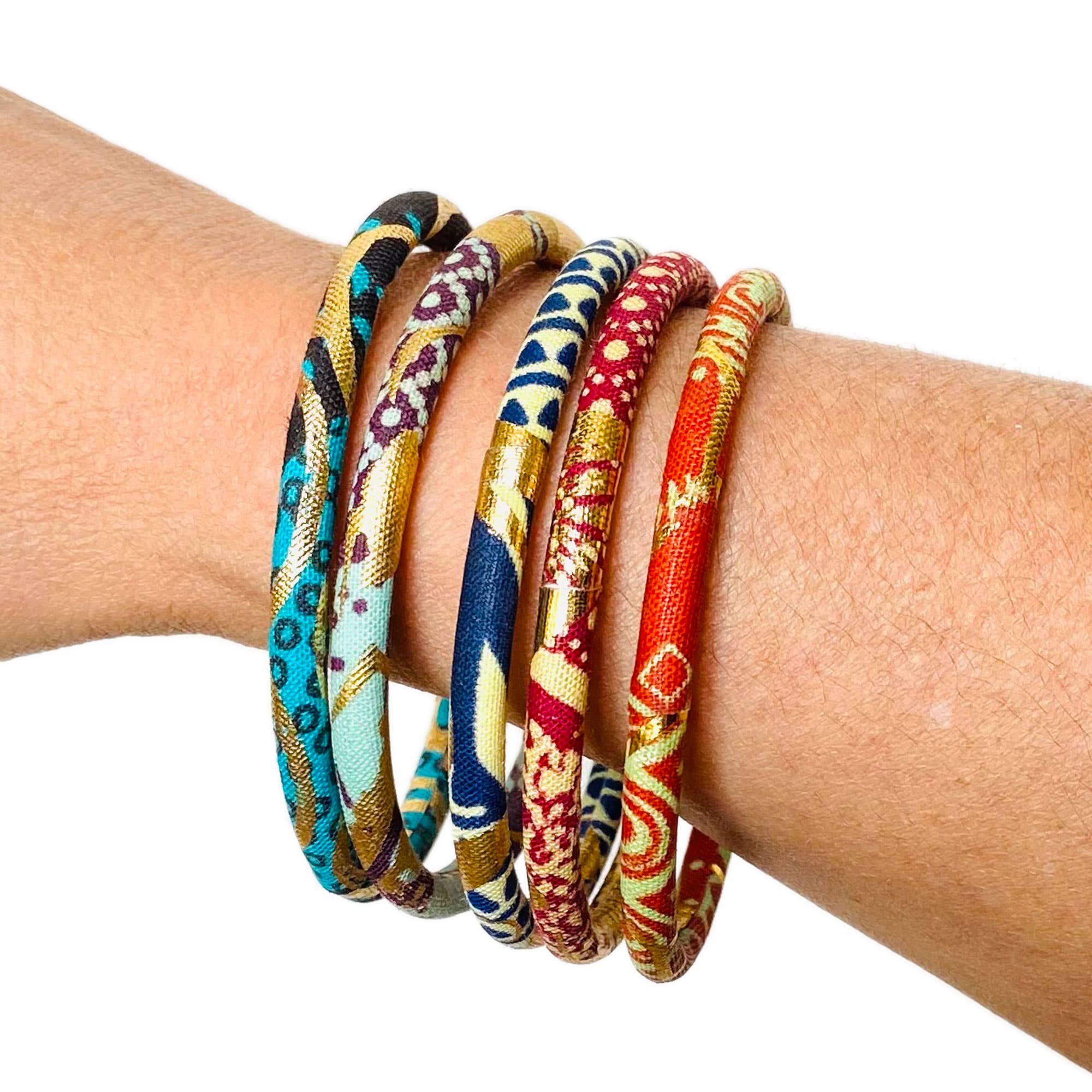 Melokane - Vendita all'ingrosso Bracciale a polsino - Bracciali rigidi in cotone wax africano rosso/ecru/oro2