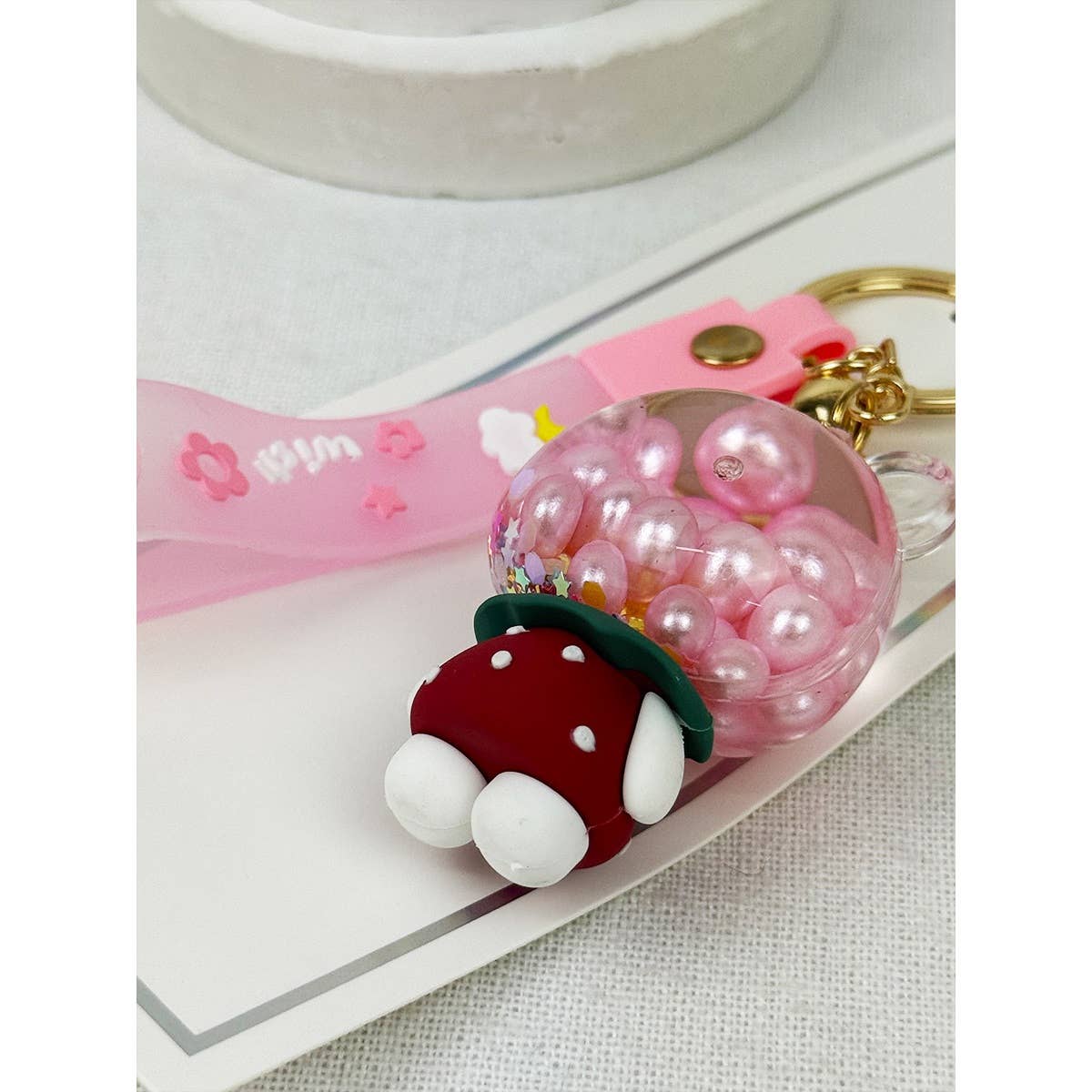 PINK Floating Pearl and Glitter Kitty Key Chain for wholesale on Faire5