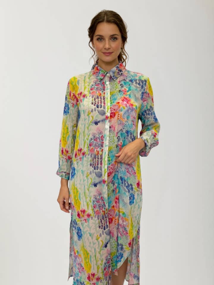 Chemisier à manches 3/4 avec fentes latérales pour la vente par APNY