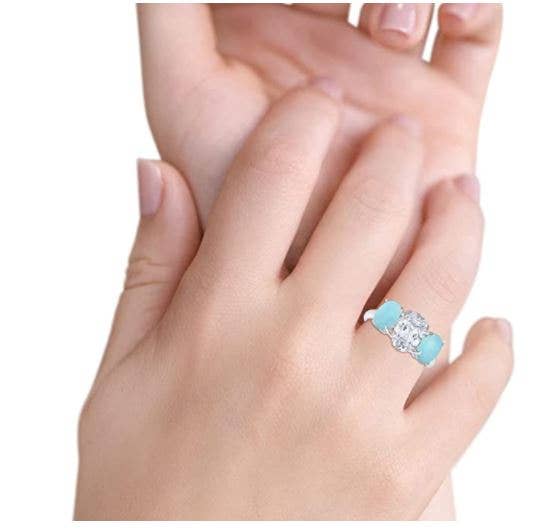 3-Stone Oval Simulated Larimar Center Stone Clear CZ Fashion Ring for wholesale on Faire4