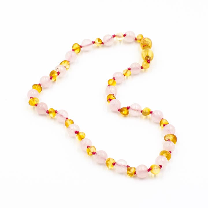 123Ambre - Vendita all'ingrosso Parure di gioielli - Confezione collana ambra+bracciale in ambra e quarzo rosa 32 cm