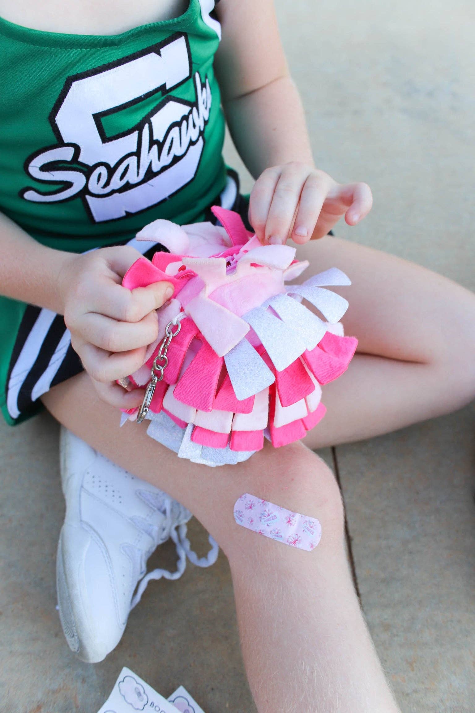Boo Boo Ball USA - Vendita all'ingrosso Kit di pronto soccorso - Portachiavi Boo-Boo con Pompon Cheer e Kit di Primo Soccorso4