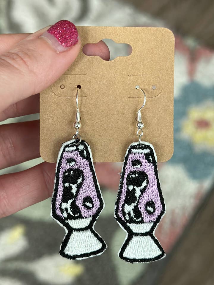 Cow Print Lava Lamp Earrings for wholesale by SlapQueen