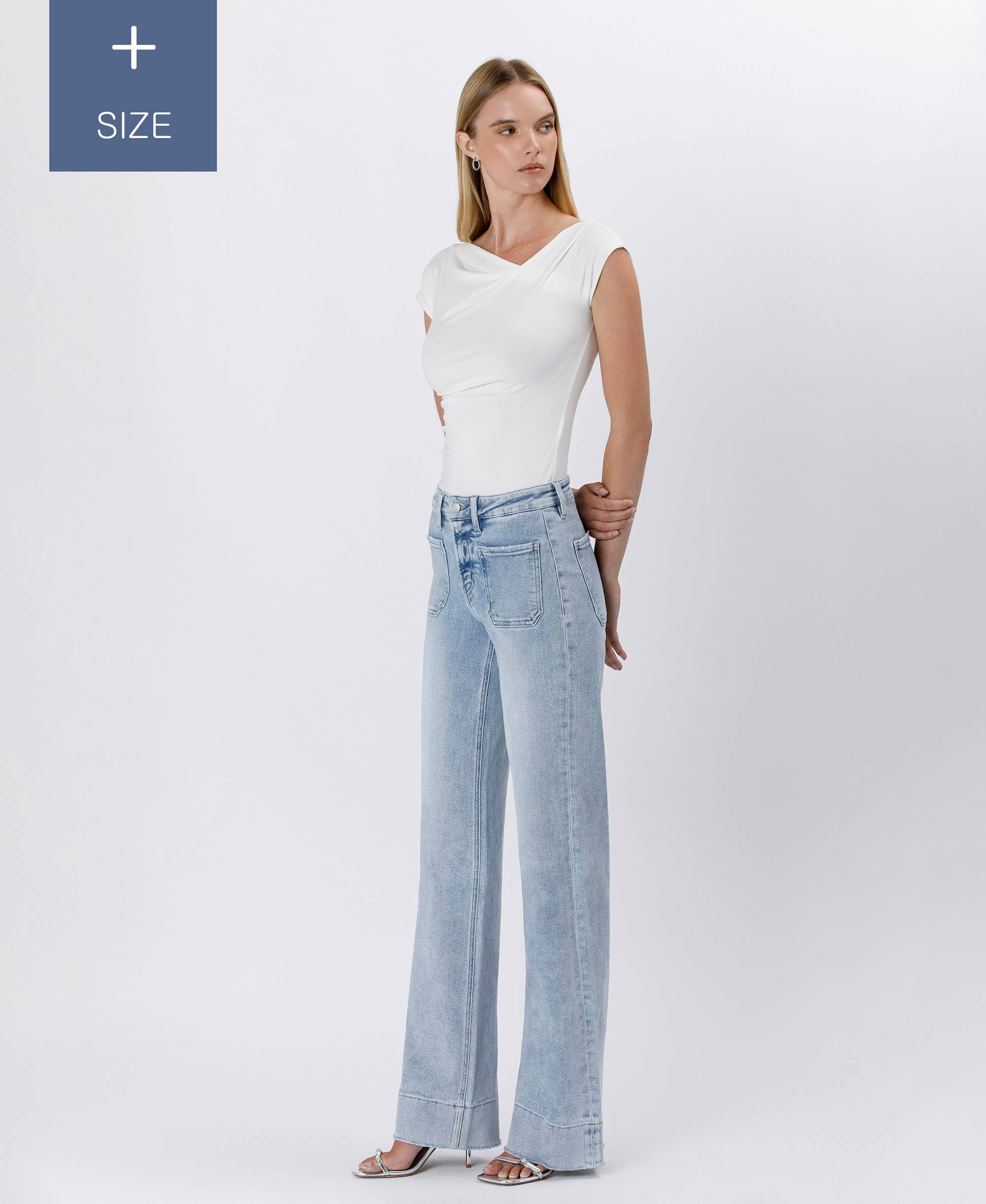 TENTAR JEANS ACAMPANADOS CON DOBLADILLO DE PANTALÓN DE TALLE ALTO DE TALLA GRANDE LV1602-P de venta al por mayor en Faire9