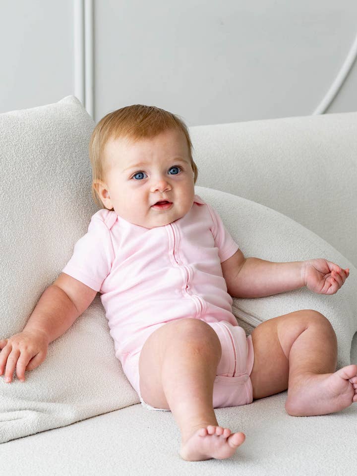 Zipper Bodysuit in Blush, Newborn for wholesale by Dreambelles