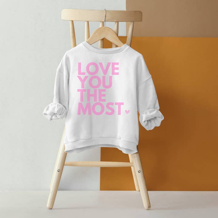 Love You The Most 🩷 Child & Toddler Crewneck Sweatshirt for wholesale by Swain Co.