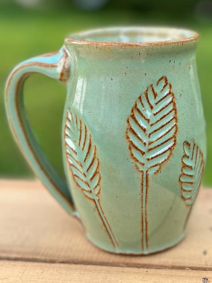 Carved Leaf Mug - Curvy for wholesale by Uphill Pottery