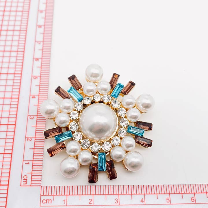 Snowflakes Colorful Rhinestone Pearl Snowflake Brooch for wholesale on Faire2
