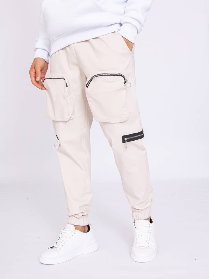 Joggers beige con tasche cargo e cerniera per la vendita all'ingrosso da parte di AARHON