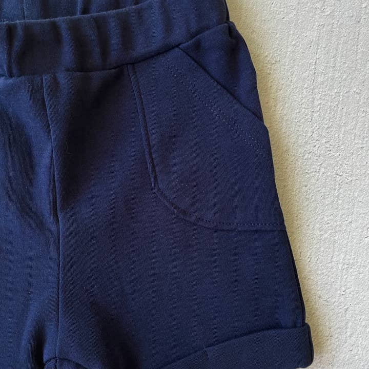 Blue Airplanes Baby Pocket Tee + Shorts Set (Organic Jersey) for wholesale on Faire