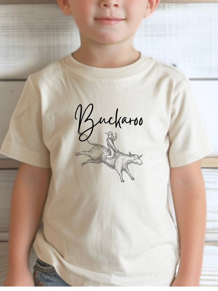 T-shirt graphique/Body pour bébé Buckaroo pour la vente par Rock n' Rodeo