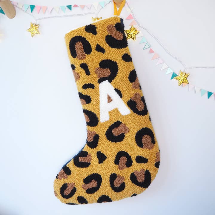 Custom Leopard Print Christmas Stocking for wholesale by Brown Betty Blue