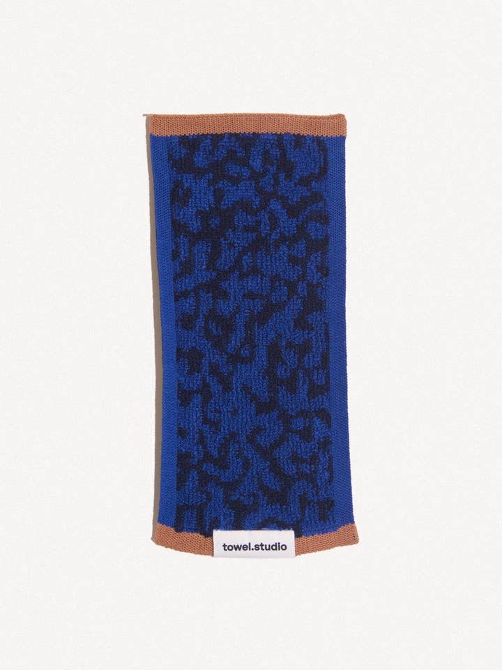 Noisy Camo Pocket Towel | Midnight Cloud for wholesale by towel.studio