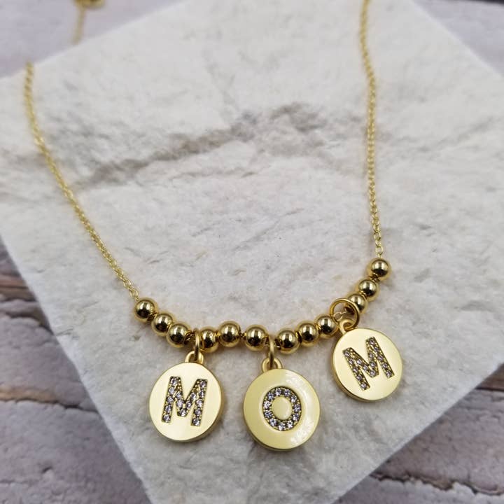 MOM Pendant Gold Bead Necklace for wholesale by Treasure Wholesale