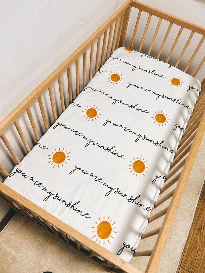 Sunshine Crib Standard Sheet for wholesale by Suga Bums LLC