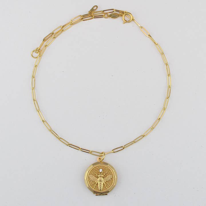 Golden Flyer Locket Necklace for wholesale by La Vie Parisienne