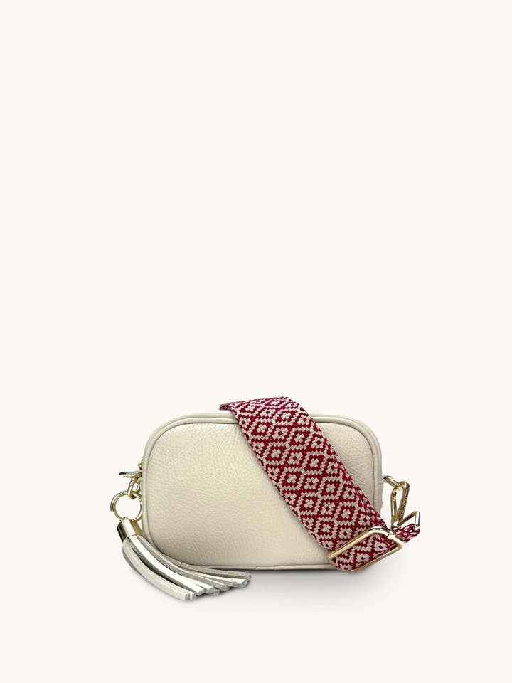 The Mini Tassel Stone Leather Phone Bag With Red Cross-Stitch Strap for wholesale by Apatchy London