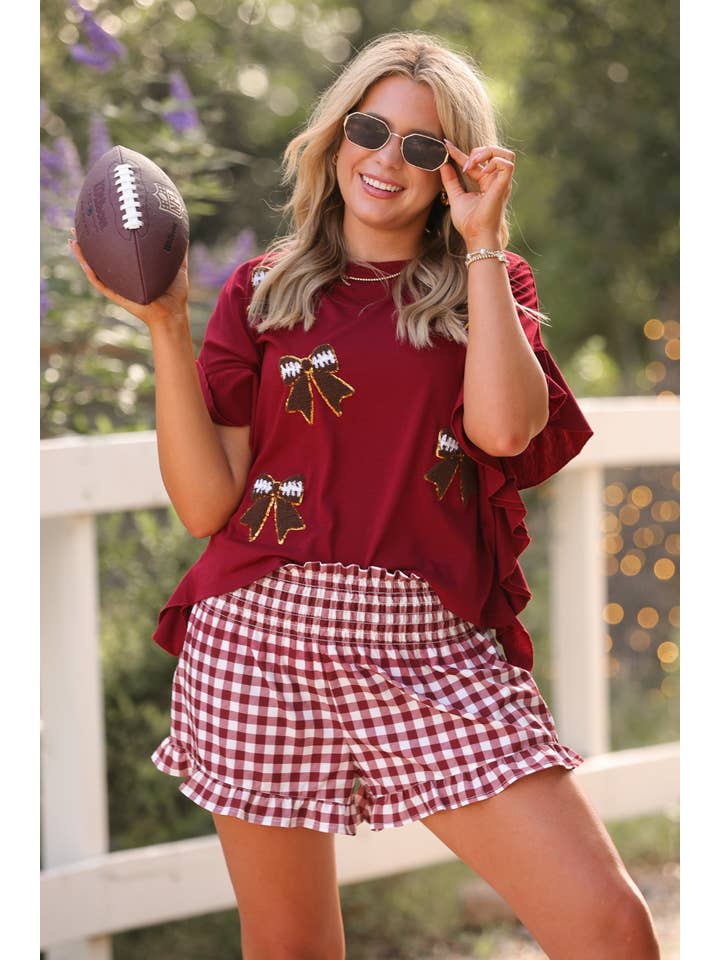 Sideline Sparkle Ruffle Top- Maroon for wholesale on Faire