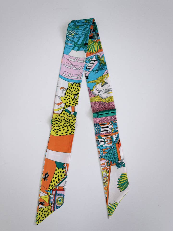 Sciarpa Parata di Motivi - Arancione e Giallo per la vendita all'ingrosso da parte di Fashionably Fitted