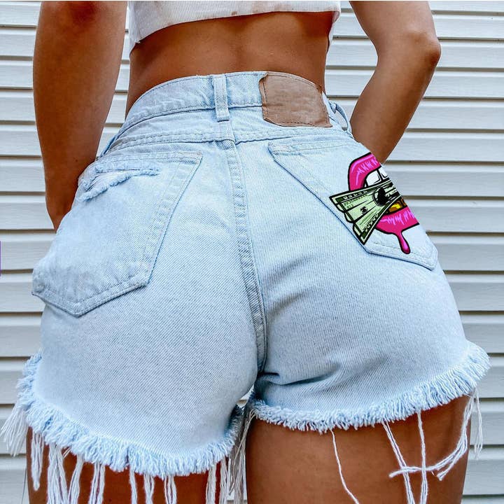 Tourtiwi - Vendita all'ingrosso Pantaloncini - Donna - Shorts di jeans strappati con stampa "Cash in the Mouth"