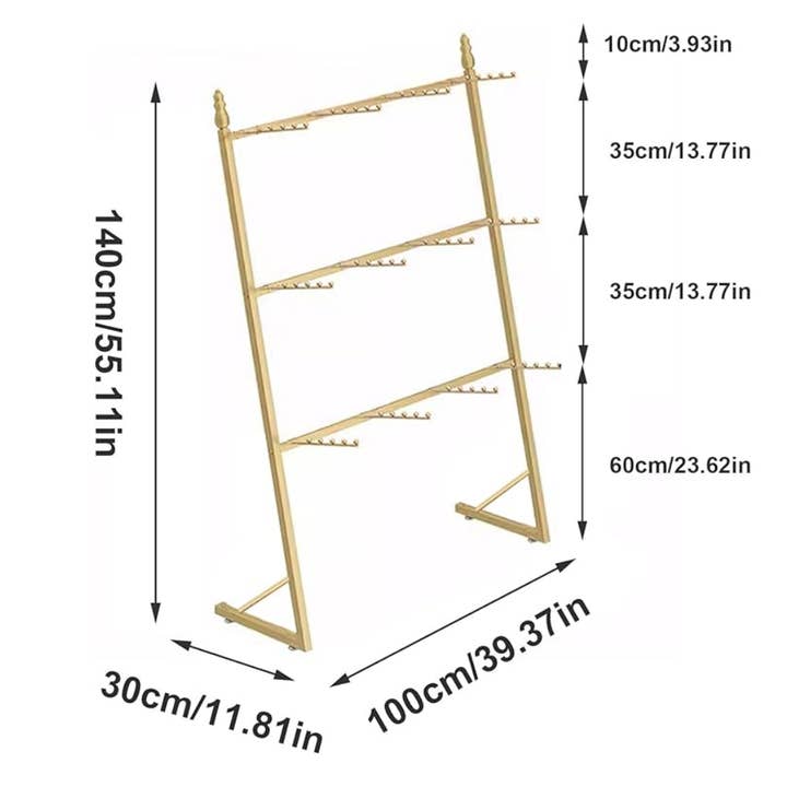 Guldfarvet etageret displaystativ for engroshandel hos Anyway Socks