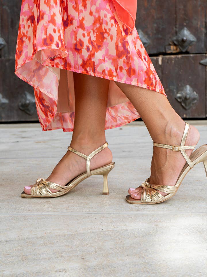 GOLDEN Gold knot heel sandal for wholesale on Faire