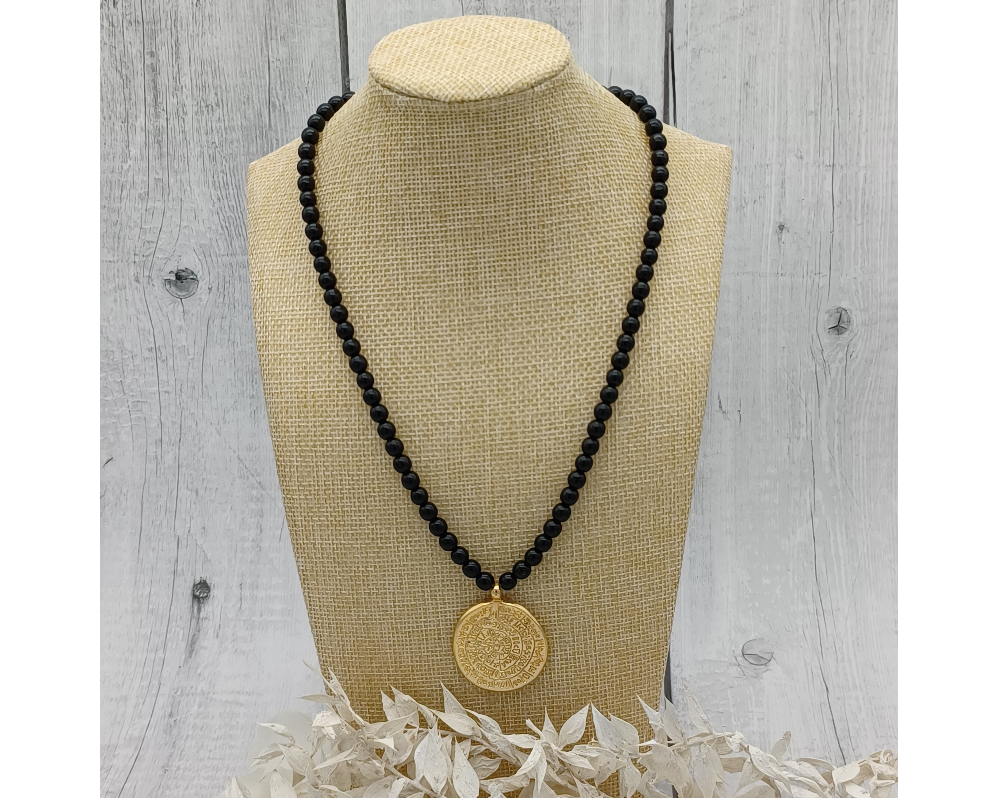 Unique black pearls with golden pendant - Serina for wholesale on Faire1