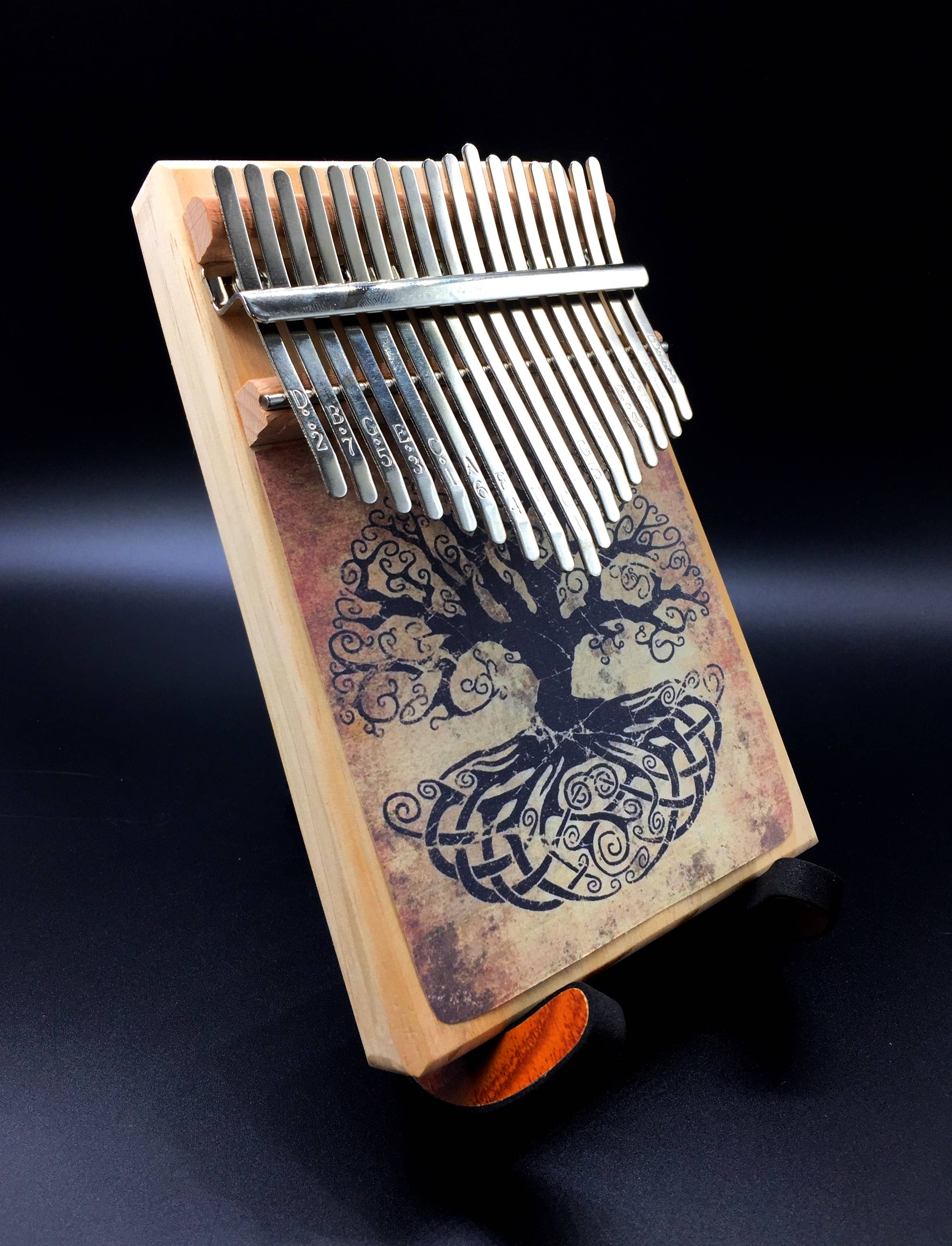 inRhythm - Vendita all'ingrosso Strumenti musicali - Kalimba con 17 note in acciaio e supporto espositivo opzionale1