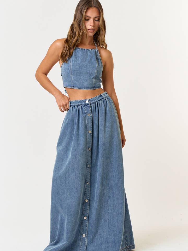 MEDIUM WASH IBS30944 DENIM HALTER BACK TIE CROP TOP AND MAXI SKIRT SET for wholesale on Faire