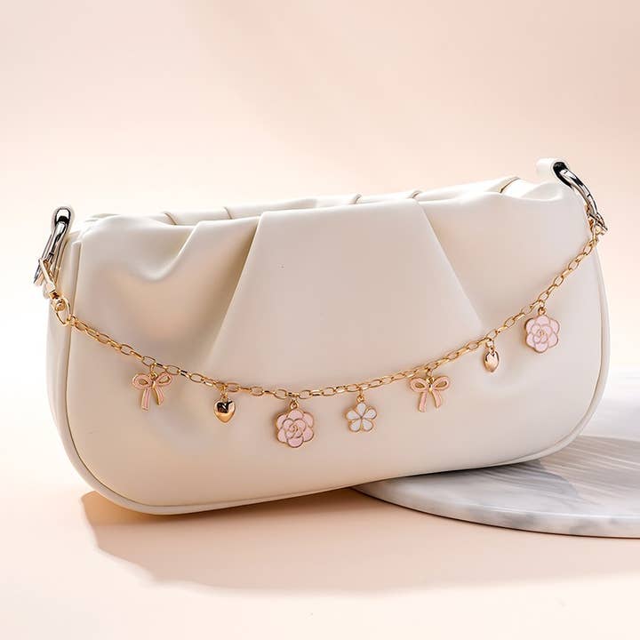 Gold CHAIN BAG CHARM-CHAIN BOW FLOWER HEART | 40KC119 for wholesale on Faire