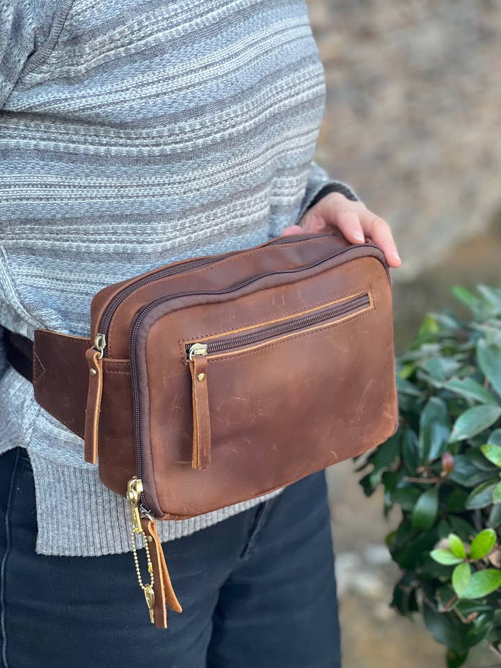 Vintage cowhide leather fanny pack/crossbody/sling bag for wholesale by Roma Leathers, Inc.