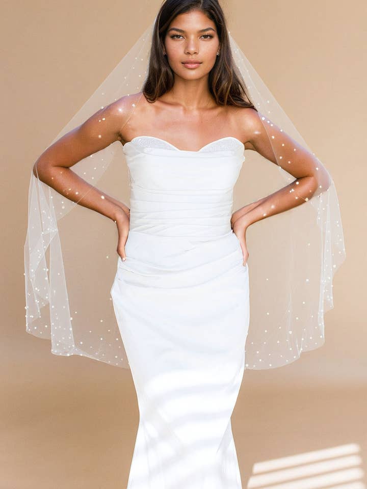 VERITY FINGERTIP VEIL EDGED WITH DENSE PEARLS for wholesale by Brides & Hairpins