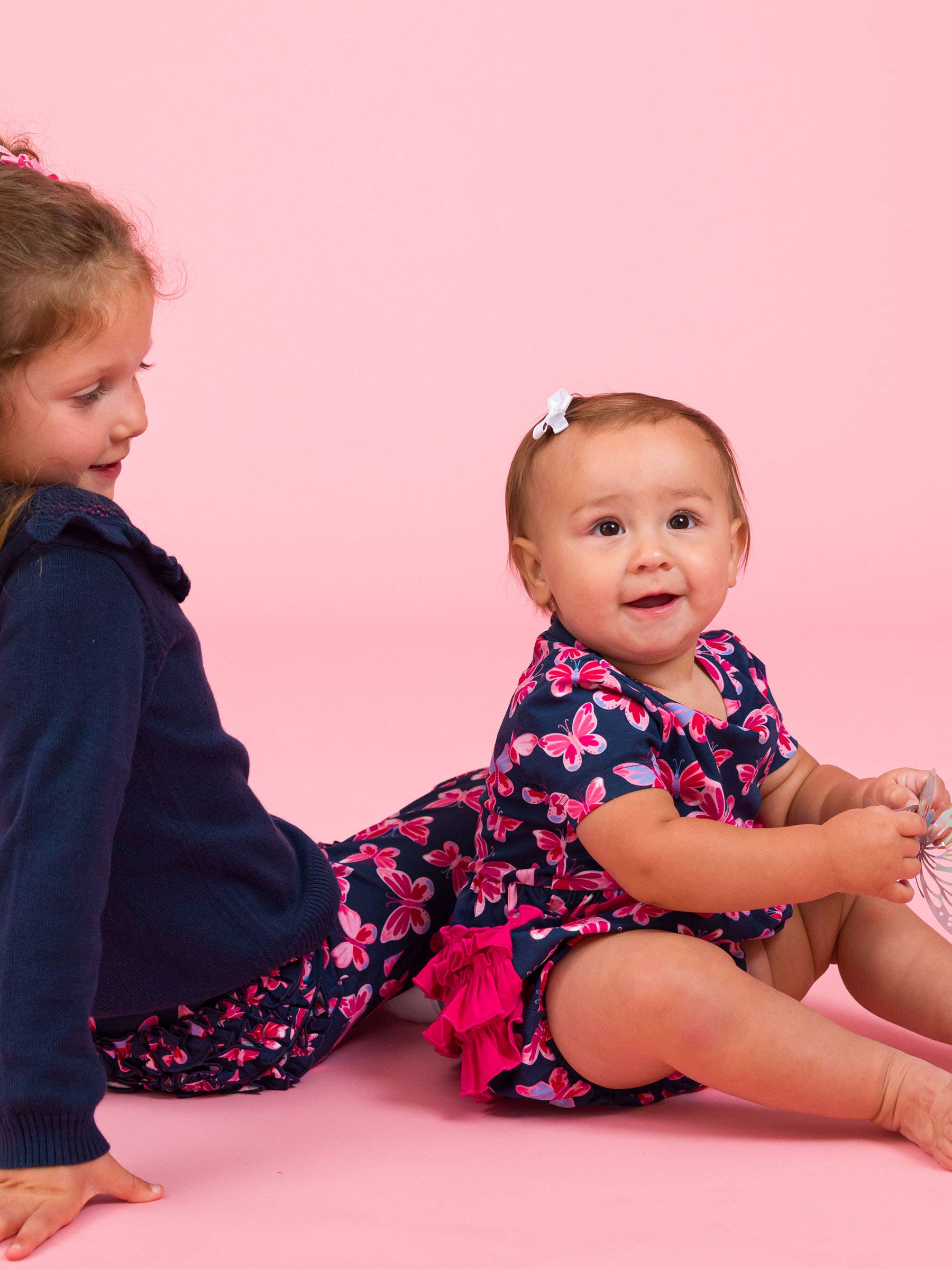 Navy Baby Girls Butterfly Bliss Knit Short Sleeve Bow Bubble Romper for wholesale on Faire3