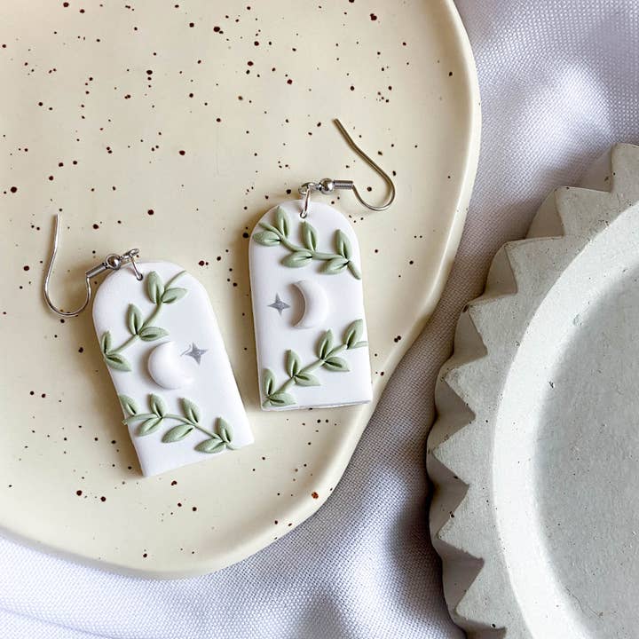 White Moon & Vine Arch Earrings for wholesale by Peripheral US