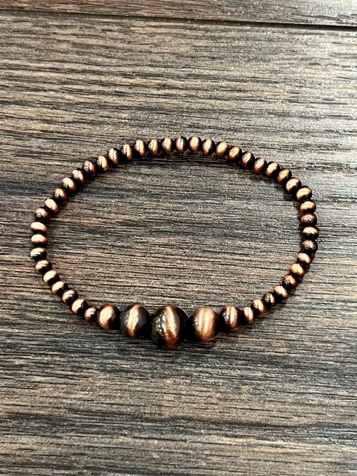 711568-1, Handgefertigtes Kupfer Navajo Perlen Stretch Armband für den Großhandel von ISAC Trading Inc