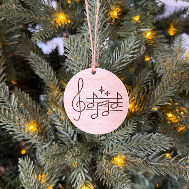 Music Notes Round Engraved Wood Ornament© for wholesale by Aurora North Home