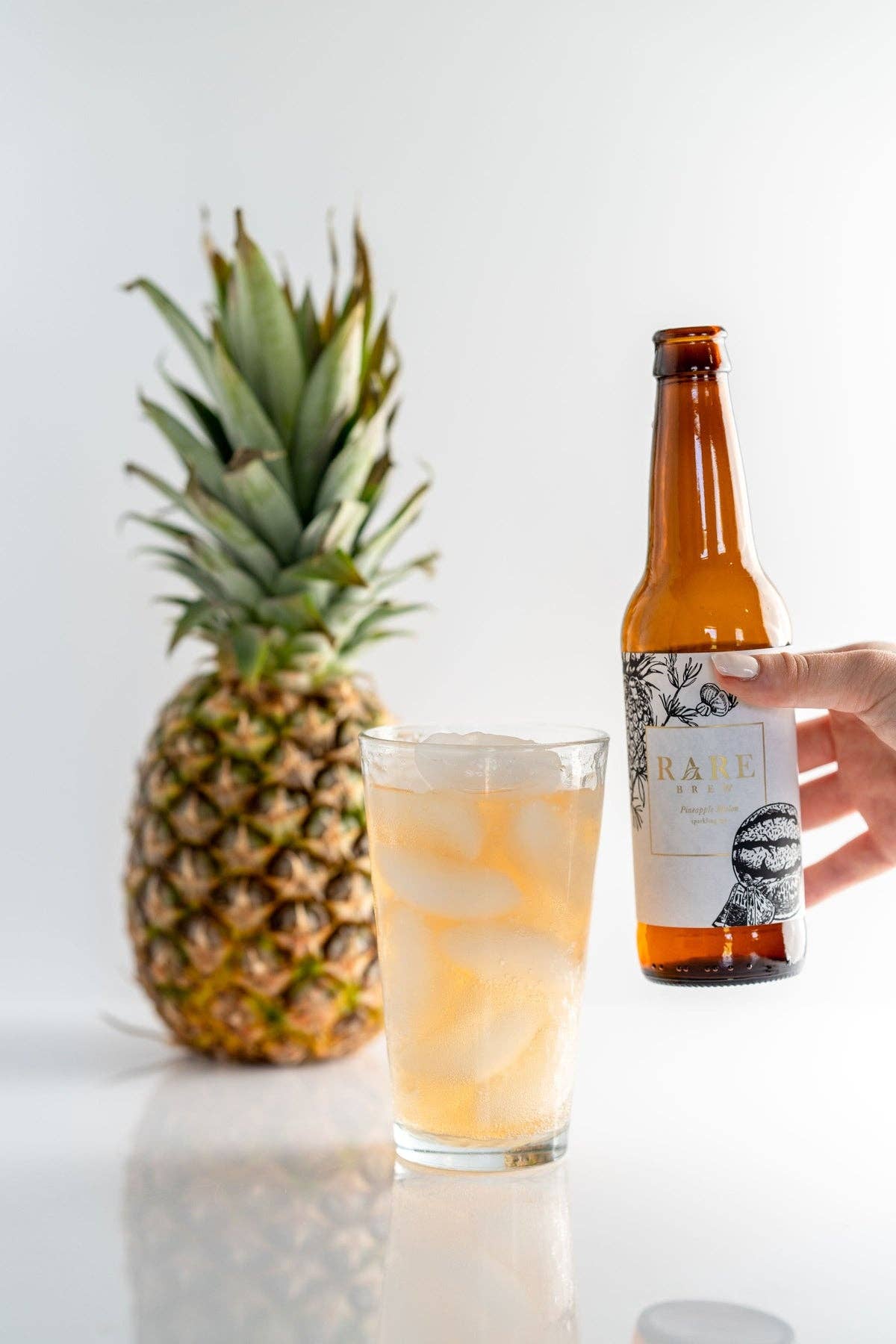 Rare Brew – Großhandel Alkoholfreier Aperitif/Mocktail – Ananas Melone - Sprudeltee - Großhandelsflasche1