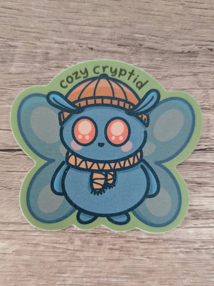 Autocollant en vinyle Cozy Cryptid - Cute Fall Attire Mothman pour la vente par Sadsquatch