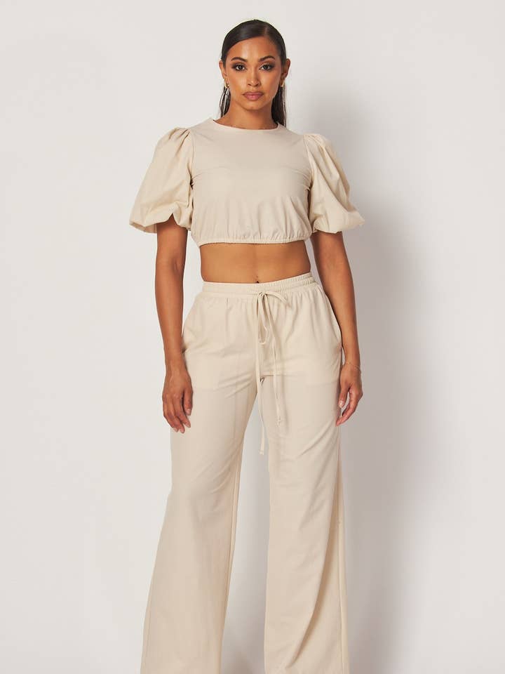 Tori Bubble Sleeve Crop Top & Pants Set (HDC32475) and other Purchase wholesale bubble set. Free returns & net 60 terms on Faire trending on Faire.